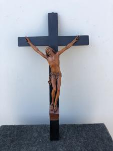 Boxwood Christ on ebonized cross.