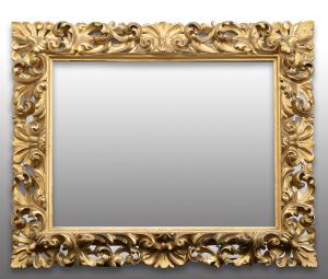 Antique Florentine gilded and carved wooden frame from the early 19th century.