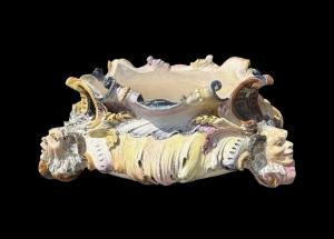 Large Baroque-shaped majolica centerpiece. Sansebastiano Moreno manufacture. Genoa.