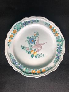 Majolica plate with floral decoration and a 'twisted neck' bird. Cerreto Sannita.