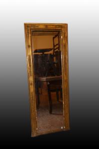 Bellissima specchiera verticale francese stile Impero dorata del 1800