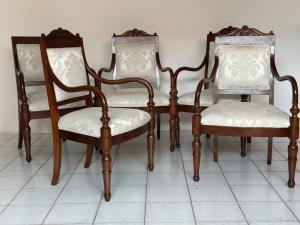 Set of five Lombard Charles X walnut armchairs. First half of the 19th century. Restored.