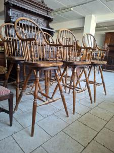 Six tall stools with armrests