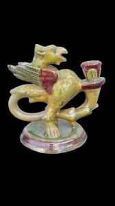Candeliere - bugia in maiolica a lustro a forma di grifone alato.Societa’Ceramica Umbra.Gualdo Tadino.
