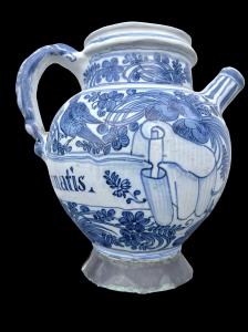 Versatoio in maiolica in monocromia turchina con decoro ‘calligrafico naturalistico’.Savona.