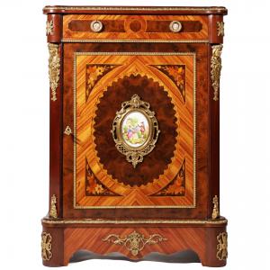 Rosewood cabinet with various wood inlays, porcelain plaques, and gilded bronze fittings, France, late 19th century.