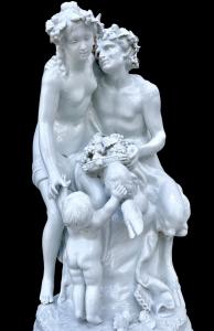 Grande gruppo scultoreo in porcellana raffigurante fauno e ninfa con putto e frutta.Manifattura di Doccia,Ginori.
