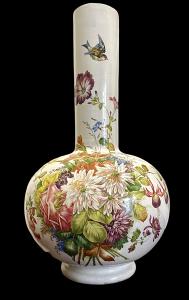 Large earthenware globular vase with floral decoration and little bird. Antonibon Manufacture, Nove di Bassano.