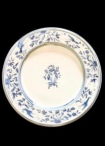 Turquoise monochrome majolica plate with stylized birds and floral and plant motifs. Pavia.