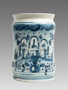Albarello/Vaso antico in maiolica smaltata raffigurante paesaggio con rovine. Napoli XVIII secolo.