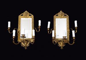 Coppia di specchiere antiche "Ventoline"Napoleone III in bronzo dorato e cesellato. Francia XIX secolo.