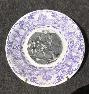 Earthenware plate with decal decoration depicting a circus scene. Sarregumines, France.