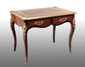 Scrittoio antico Napoleone III Francese in legni esotici pregiati con innesti di elementi in bronzo dorato. Periodo XIX secolo.