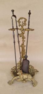 Fireplace tool set in brass decorated with dog