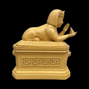 Mustard-colored earthenware box with sphinx depiction and neoclassical motifs. Wilhelm Schiller & Sons. Bohemia.