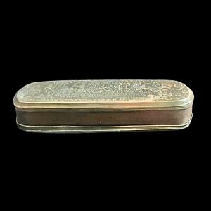 Brass snuff box engraved with hunting scenes with text on one side and historical scenes with characters on the other.