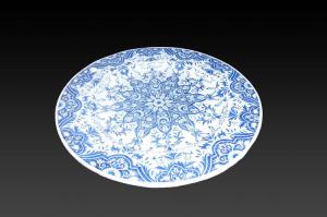 Large 19th-century ceramic plate decorated in blue on a white background.
