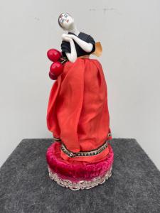 Box with Pierrot figure in porcelain and powder compact structure in fabric-cardboard. France. 34x14 cm.