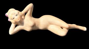 Small bisquit porcelain female nude figure.