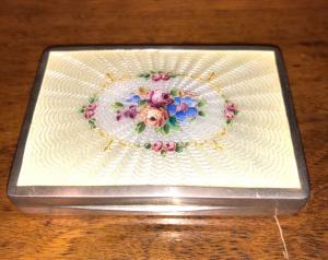 Silver and enamel cigarette case with floral decoration. Austria.