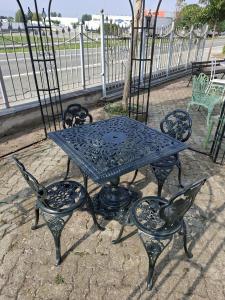 Cast iron table and chairs