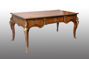 Scrivania /Bureau Plat antica Napoleone III Francese in legno esotico pregiato con innesti di elementi in bronzo dorato. Francia XIX secolo.