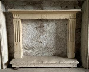 Louis XVI yellow stone fireplace