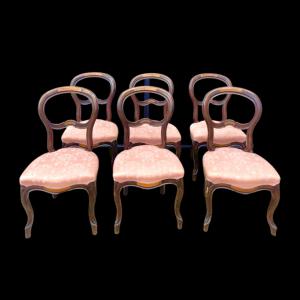 Six walnut chairs with burr wood decorative elements. Louis Philippe period.