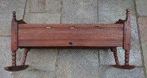 Splendid carved Swiss pine cradle from the late 18th to the early 19th century