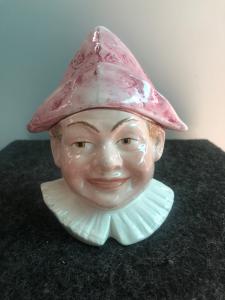 Earthenware tobacco box depicting a jester's head. England