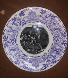 Earthenware plate with circus-themed transfer decoration. Sarreguemines manufacture. France.