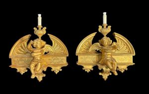 Pair of carved and gilt wood sculptures