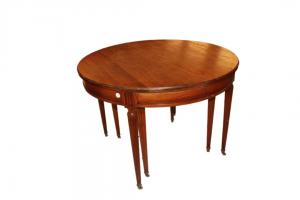 French Louis XVI style circular table with 8 legs, extendable in mahogany