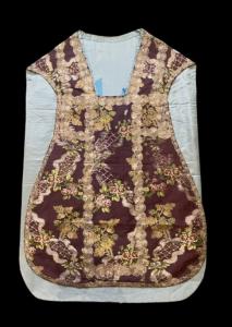 Sacerdotal sacred vestment Chasuble with floral embroidery.