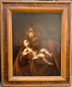 San Giuseppe con il bambino su splendida cornice coeva con lacca a finto marmo.