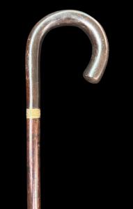 Rosewood 'animated' cane with a baton inside.