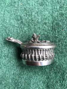 Silver 'mignon' gravy boat with geometric and floral decorations. Italy.