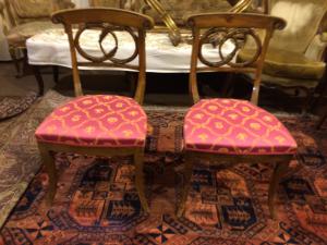 No. 6 beech chairs from the early 19th century with gilded swan backrests.