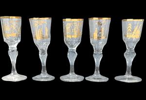 Set of five faceted glass shot glasses with gold decorations. Murano.