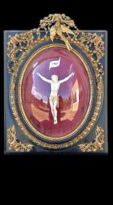 Ivory Christ figure inside a frame.
