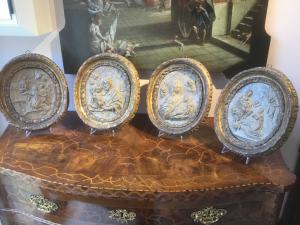 Four terracotta high reliefs