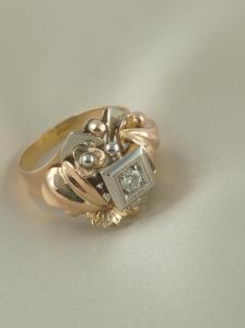 ANELLO ORO ROSA E BIANCO CON DIAMANTE