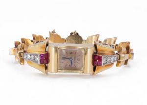 Lady Jaeger 18k gold wristwatch with diamonds (1.80ct) and rubies, 1930s