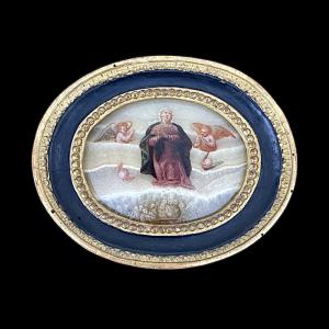 Oval alabaster painting with a scene of Madonna with angels and figures. Tuscany.