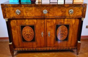 Secretary desk, with a drop-leaf door for extracting the writing surface.