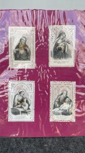 Gruppo di sette santini canivet in carta merlettata.Francia