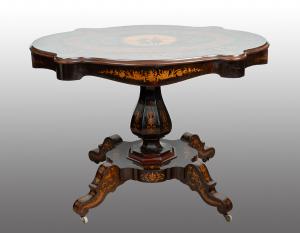 Antique center room table in fine exotic woods. Nice 19th century.