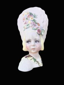 Ceramic female bust with hat and raised floral motifs. Essevi by Sandro Vacchetti, Turin.
