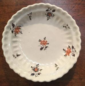 Majolica plate with high-fire floral decoration. Coppellotti manufacture, Lodi.