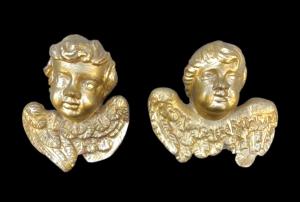 Two cherub figures in carved wood and gold leaf. Liguria.